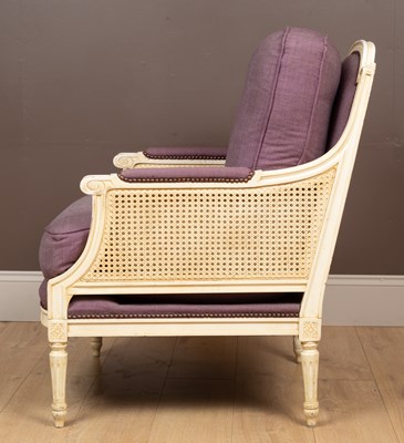 Lot 212 - A white painted French style open armchair