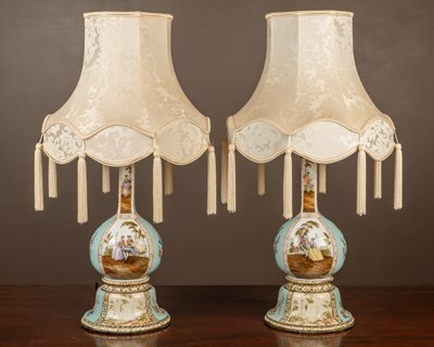 Lot 44 - A pair of 19th century French style porcelain table lamps