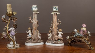 Lot 46 - A collection of porcelain to include a pair of figural candlesticks by Bohne Sohne