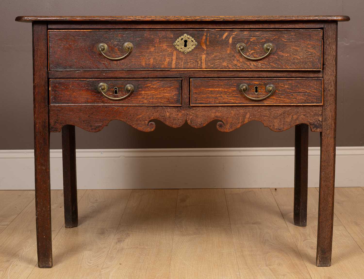 Lot 228 - An 18th century oak side table