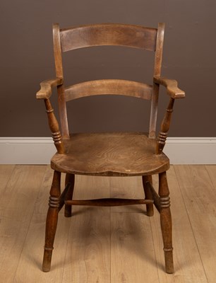 Lot 241 - A farmhouse open armchair