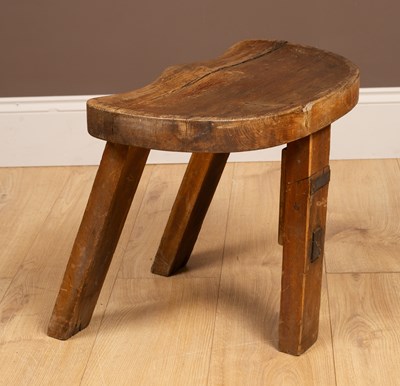 Lot 246 - A rustic milking stool