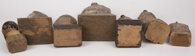 Lot 194 - A group of seven antique carved wood Santos...