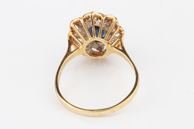 Lot 55 - A sapphire and diamond dress ring, the oval...