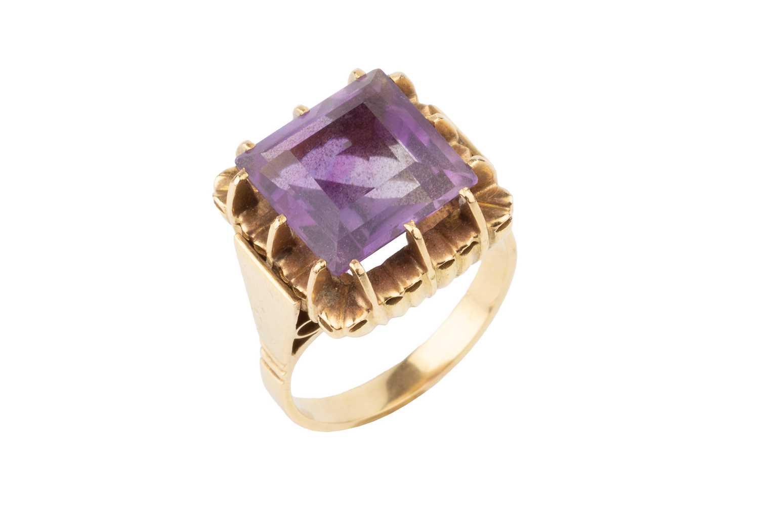 Lot 56 - An amethyst cocktail ring, the square cut...