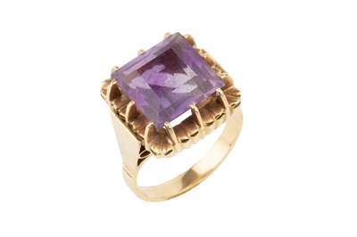 Lot 56 - An amethyst cocktail ring, the square cut...