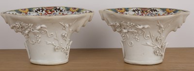 Lot 106 - Pair of export porcelain libation cups and...