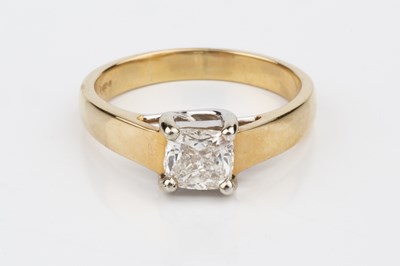 Lot 72 - A diamond solitaire ring, the cushion cut...