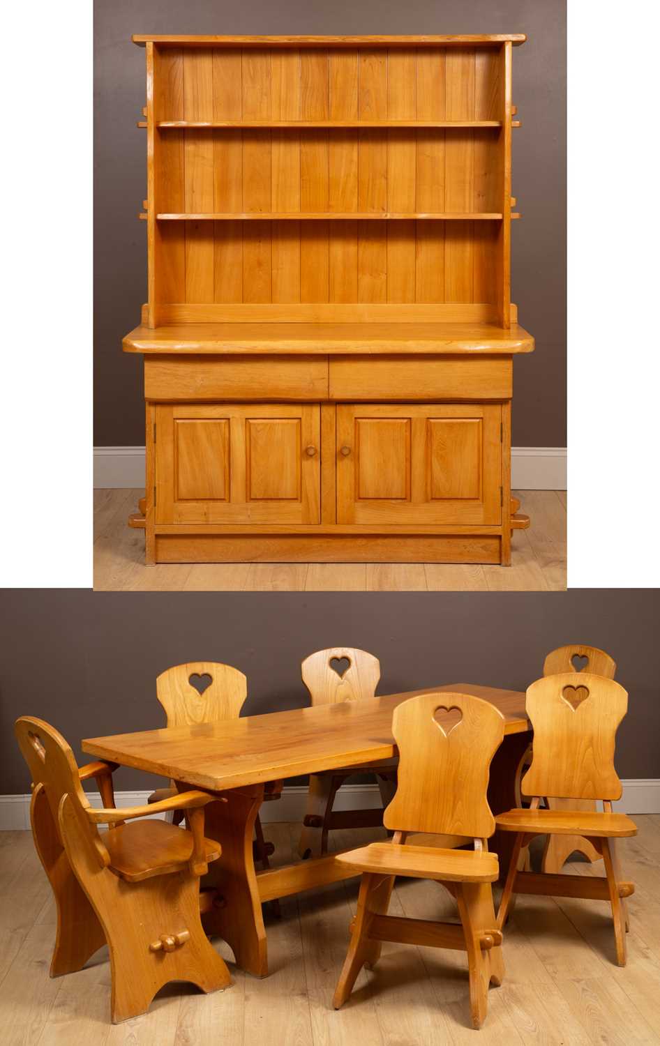 Lot 264 - A suite of elm dining furniture