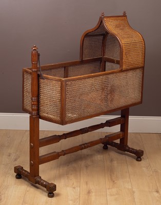 Lot 319 - A Regency rattan cradle