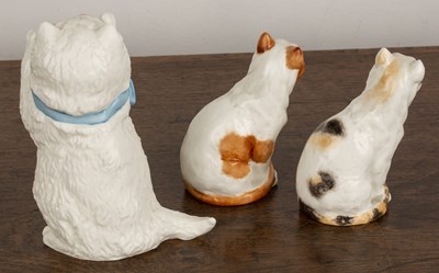 Lot 310 - Three Royal Worcester porcelain cats the...