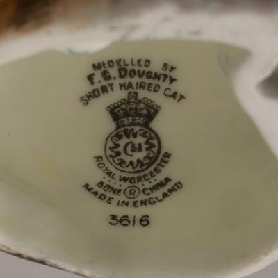 Lot 310 - Three Royal Worcester porcelain cats the...