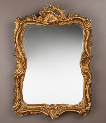 Lot 305 - A gilt wall Rococo style wall mirror