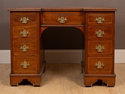 Lot 314 - A reproduction Regency mahogany inverted breakfront pedestal desk