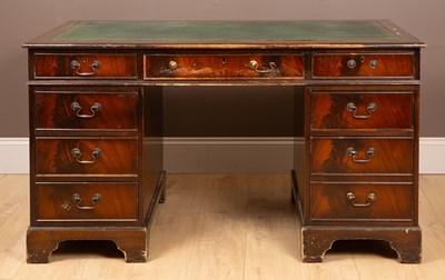 Lot 323 - A reproduction Regency style mahogany pedestal desk