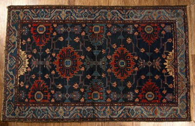 Lot 43 - Blue ground Caucasian rug with geometric...