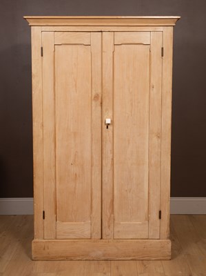 Lot 337 - A pine two-door wardrobe