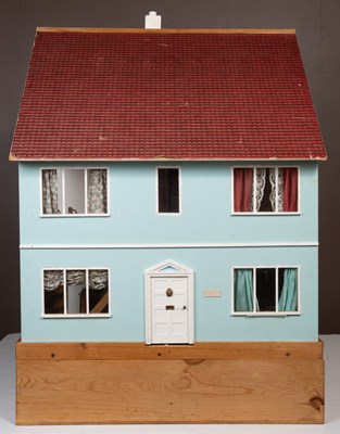 Lot 138 - A dolls house and contents