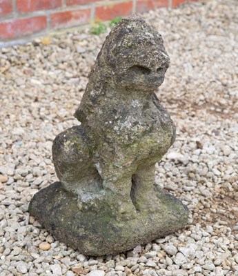 Lot 1219 - A cast reconstituted stone sculpture of a dragon or a winged lion