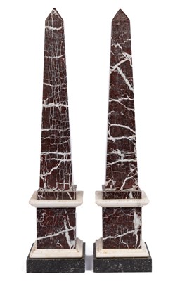 Lot 511 - A pair of red marble obelisks