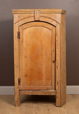 Lot 340 - An antique pine floor standing corner cupboard