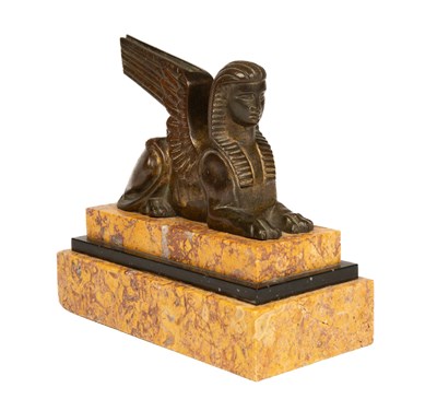Lot 34 - A bronze statuette of a winged sphinx