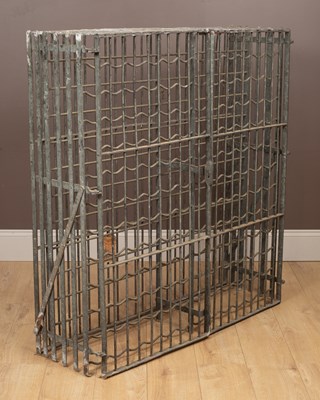 Lot 1179 - A galvanised iron lockable wine rack for 144 bottles