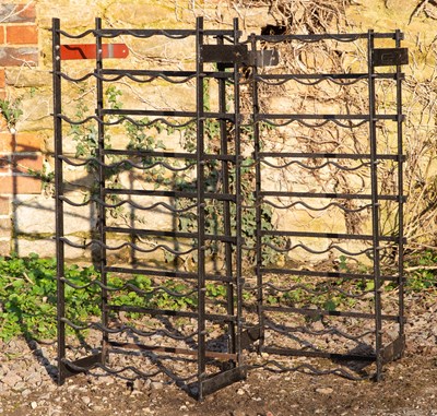 Lot 1190 - Two small wrought iron wine racks