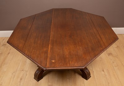 Lot 358 - A walnut octagonal dining table