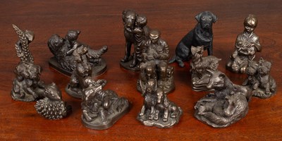 Lot 413 - A collection of bronzed statuettes depicting animals