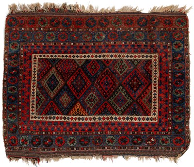 Lot 415 - A tribal rug