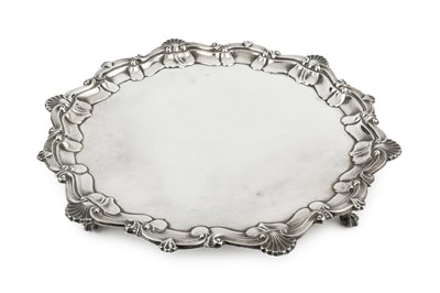 Lot 770 - A George V silver salver, with shaped scroll...