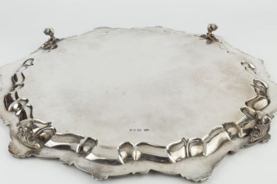 Lot 770 - A George V silver salver, with shaped scroll...