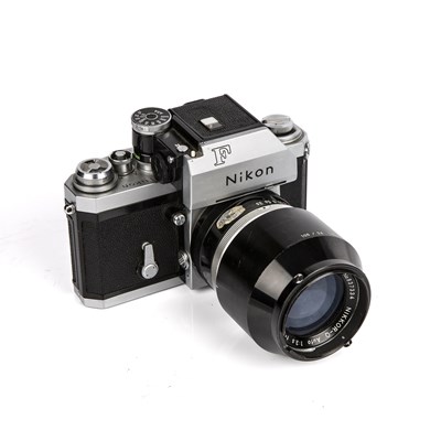 Lot 303 - A Nikon F Camera serial number 6887880 with a...