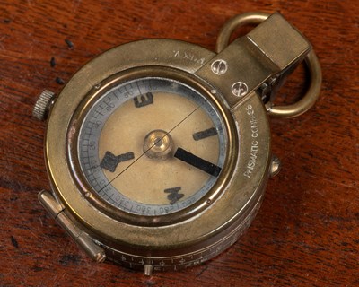 Lot 11 - A collection of military compasses