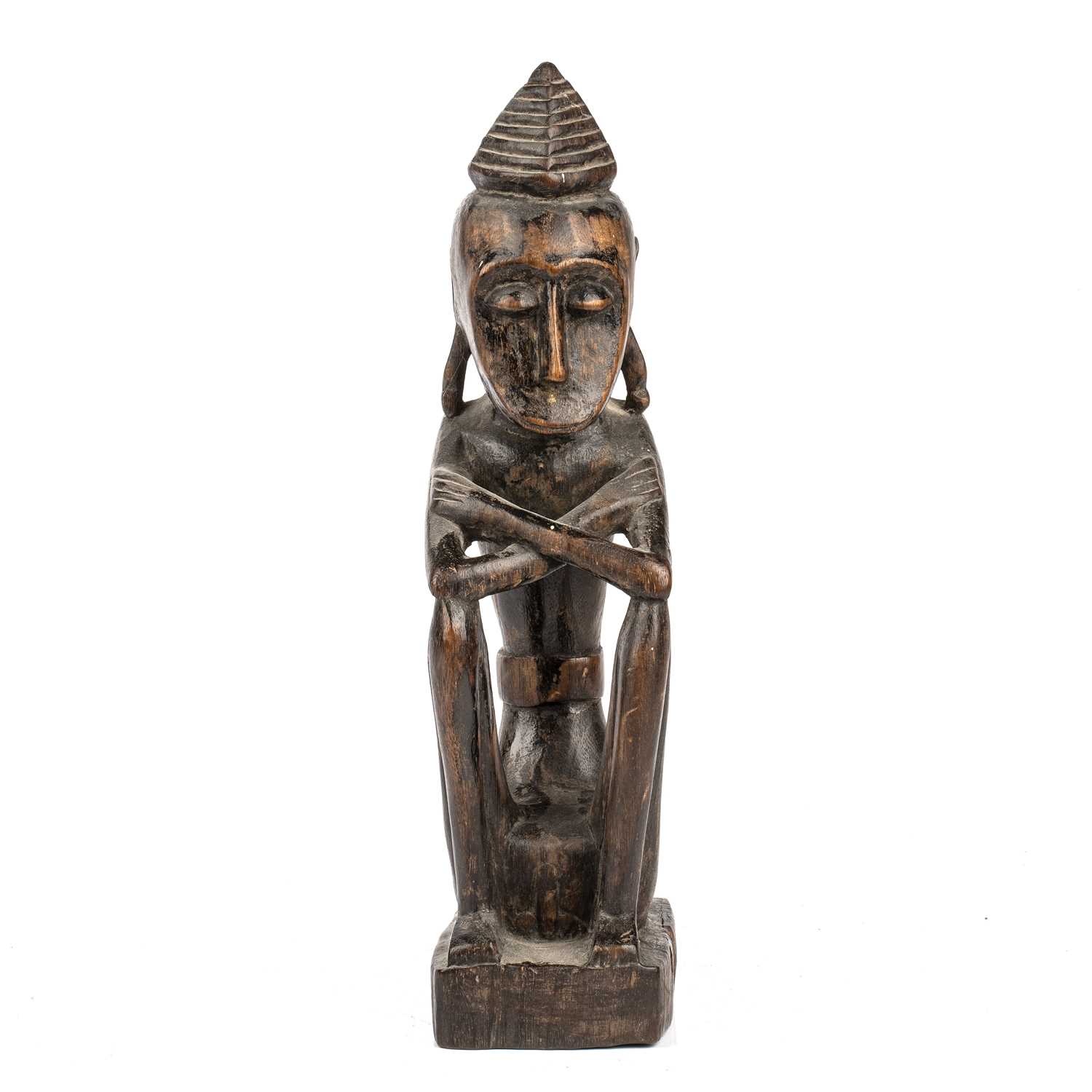 Lot 348 - An antique carved wood tribal seated figure...