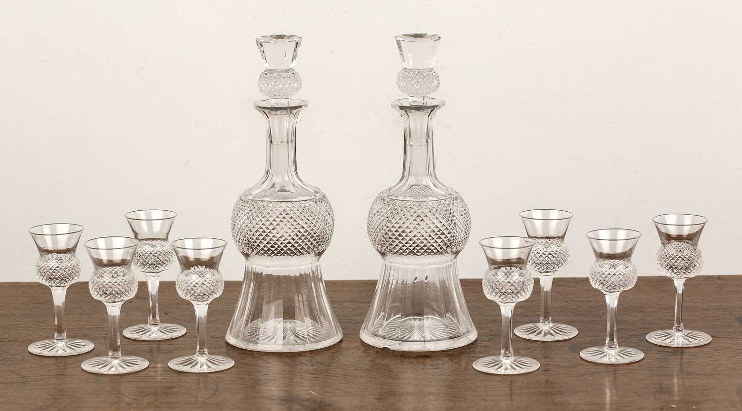 Lot 231 - Pair of Scottish cut glass thistle decanters...