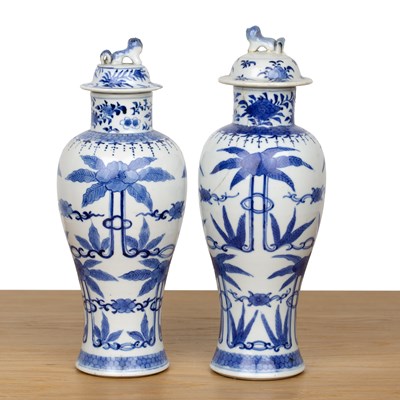 Lot 49 - Two similar blue and white porcelain vases and...