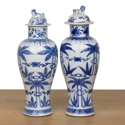 Lot 49 - Two similar blue and white porcelain vases and...