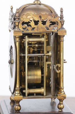 Lot 54 - Brass cased lantern striking clock early 20th...