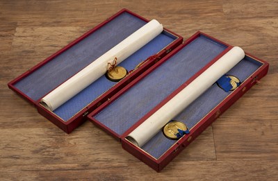 Lot 328 - Two Edwardian scrolls in gilt-tooled boxes to...