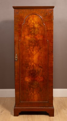 Lot 365 - A walnut hall cupboard