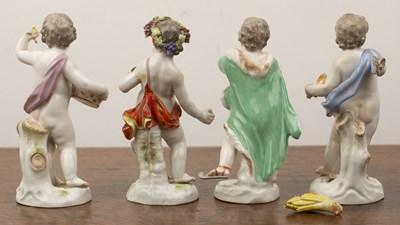 Lot 261 - Set of four Meissen putti figures as...