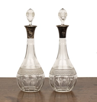 Lot 246 - Pair of silver mounted wine decanters with...