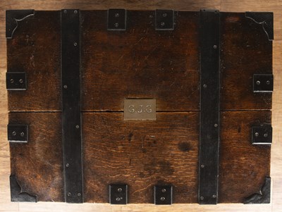 Lot 1 - Heavy oak and iron-bound silver trunk with a...