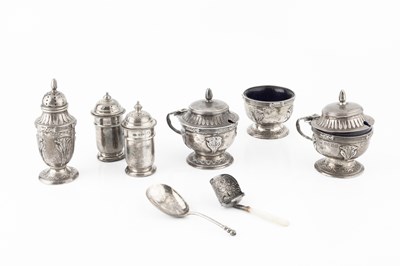 Lot 780 - A George V silver three piece cruet set,...