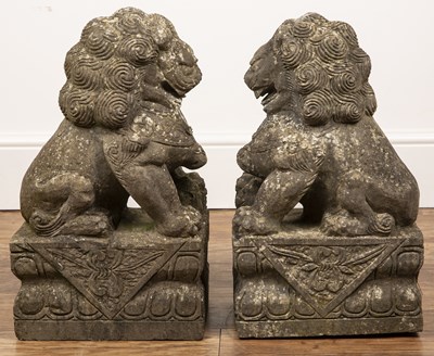 Lot 28 - Pair of reconstituted stone temple dogs in the...