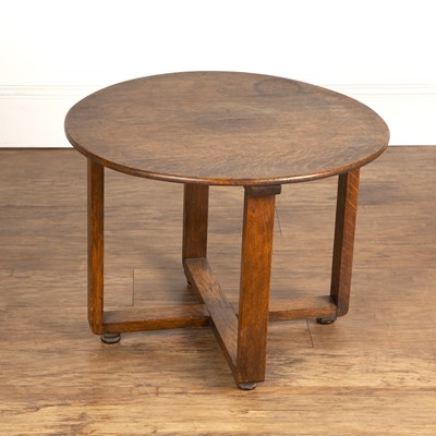 Lot 53 - In the manner of Heals oak, circular topped...