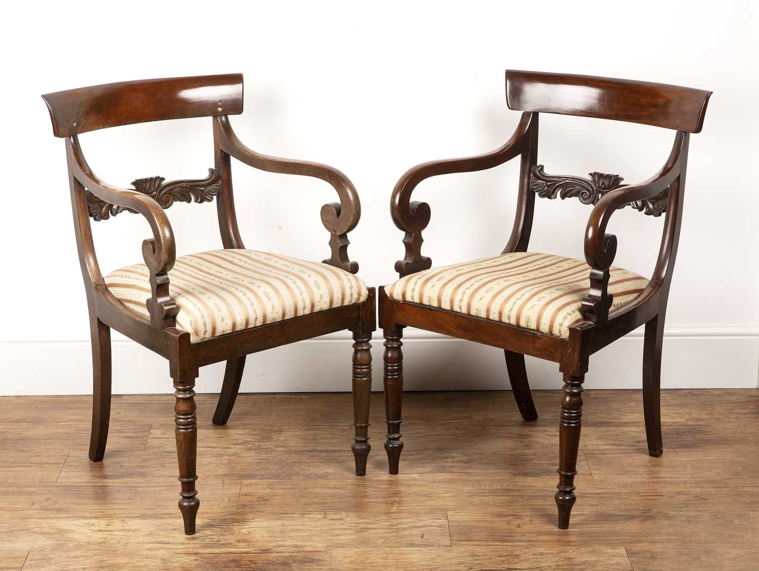 Lot 58 - Pair of mahogany elbow chairs Regency, with...