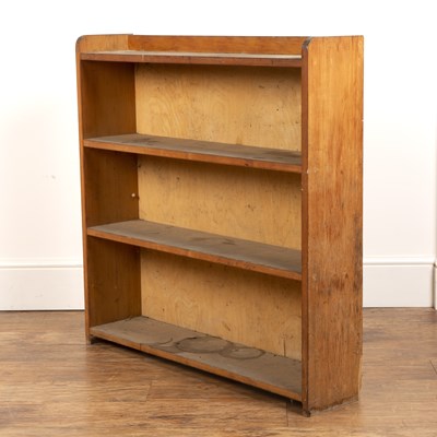Lot 54 - Cotswold School pine open bookcase, with...